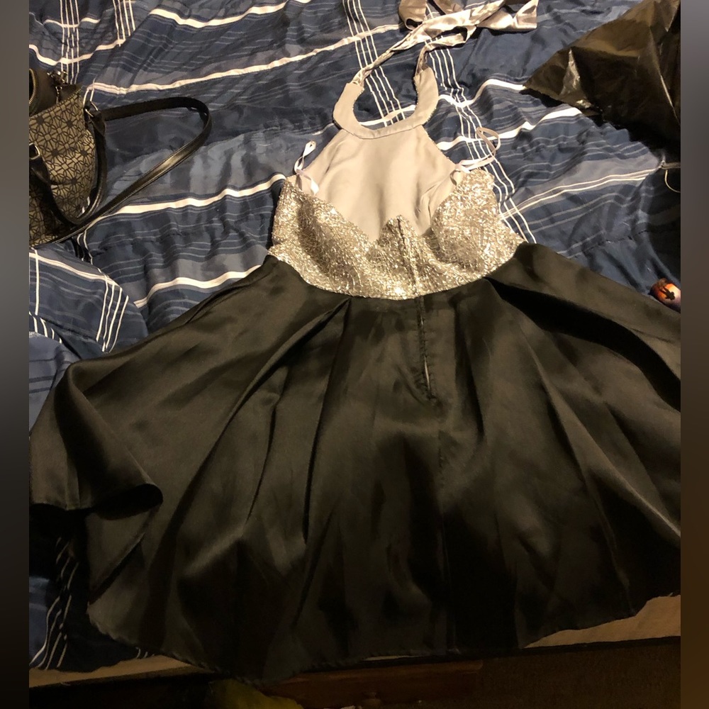 Brand new with cool about this dress has pocket on the black part of the skirt